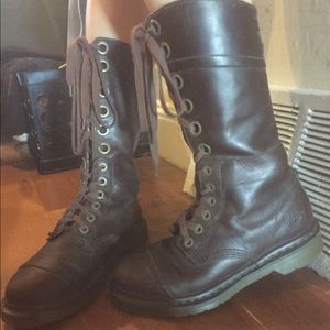 Tall leather laced up boots